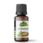 Pansar Essential Coriander Essential Oil amber glass bottle with a black cap, featuring a white label with fresh coriander leaves and a wooden bowl of coriander seeds.