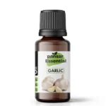 Pansar Essential Pure Garlic Oil in an amber glass bottle with two fresh garlic bulbs and cloves featured on the label.