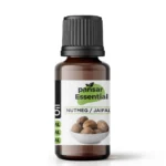 Amber glass bottle of Pansar Essential Pure Nutmeg Jaifal Oil with a black ribbed cap and a white label showing whole nutmeg seeds in a bowl.