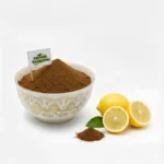 Pansar Essential natural lemon peel powder in a decorative white bowl next to fresh sliced lemons for skin brightening