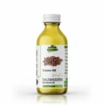 Clear glass bottle of Pansar Essential pure, organic, cold-pressed castor oil (Arandi ka Tail) against a clean white background.