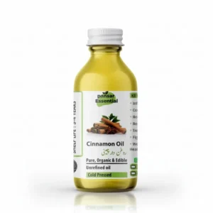 Pansar Essential cold-pressed, unrefined cinnamon oil bottle labeled in English and Urdu (روغن دار چینی) on a plain background.