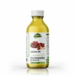 Clear glass bottle of Pansar Essential Organic Cold-Pressed Jojoba Oil against a plain white background.