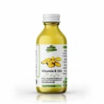Pansar Essential Vitamin E Oil ki glass bottle, jis par white label, softgel capsules ki picture aur 'Pure, Organic & Natural, Unrefined oil, Cold Pressed' likha hai.